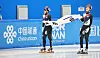 Park Ji-won, left, and Jang Seong-woo celebrate winning silver and bronze medals, respectively, in the short track men's 500-meter final at the Asian Winter Games in Harbin, China, on Feb. 8. [YONHAP]