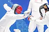 Korea's Lee Ji-hoon, left, competes in a fencing ranking match as part of the modern pentathlon competition at the Hangzhou Asian Games in Hangzhou, China on Wednesday. [NEWS1]
