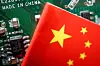 A Chinese flag is displayed next to a ″Made in China″ sign seen on a printed circuit board with semiconductor chips, in this illustration picture taken Feb. 17, 2023. [REUTERS/YONHAP]