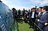 Prime Minister Kim Min-seok looks at solar power panels at a village in Yeoju, Gyeonggi, on Nov. 20. [NEWS1]