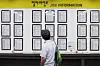 A person looks over job information in Seoul. [YONHAP]