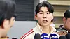 Kim Hye-seong of the Los Angeles Dodgers, who won the MLB World Series, answers questions from reporters after arriving at Incheon International Airport on Thursday. [YONHAP]