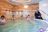 North Korea's leader Kim Jong-un, far right, looks around the Onpho Working People's Holiday Camp in North Hamyong Province on Jan. 20, after attending a ceremony to open the hot spring resort after years of remodeling. [KOREAN CENTRAL NEWS AGENCY]