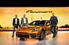 From left, Peter Varga, director of exterior design at Porsche, Detlev von Platen, member of the executive board for sales and marketing, and Oliver Blume, chairman of the executive board pose with the latest Panamera Turbo E-Hybrid at an unveiling event in Shanghai, China, on Friday. [PORSCHE KOREA]