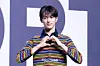 Cortis’s Keonho poses for photos during a showcase for the release of the band’s first EP, ″Color Outside the Lines,″ at the Blue Square in central Seoul on Aug. 18. [DANIELA GONZALEZ PEREZ]