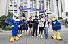 Students participating in the Yonsei International Summer School take a photo with the university's mascot Yonsuri during an orientation held June 27. [YONSEI UNIVERSITY]
