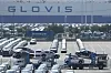 New cars for export on a car carrier trailer arrive at a port in Pyeongtaek, Gyeonggi, on April 15. [AP/YONHAP]