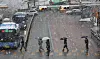 Pedestrians cross a street in Hongje-dong, Seodaemun District, western Seoul, on March 18. [YONHAP]