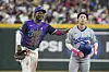 Arizona Diamondbacks shortstop Geraldo Perdomo, left, gives Los Angeles Dodgers infielder Kim Hye-seong a pat on the back during an MLB game in Phoenix, Arizona, on May 11. [AP/YONHAP]