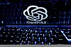 A keyboard is placed in front of a displayed OpenAI logo in this illustration taken Feb. 21, 2023. [REUTERS/YONHAP]