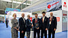 From right, Brett Budis, head of global PMO at Lotte Biologics; Shin Yoo-Yeol, head of global strategy; James Park, CEO of Lotte Biologics; and executives from Ottimo Pharma pose for a photo after a signing ceremony held at Lotte Biologics' booth for 2025 BIO International Convention in Boston on June 18. [LOTTE BIOLOGICS]