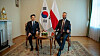 Kang Hoon-sik, left, presidential chief of staff, poses for a photo with Polish Deputy Prime Minister and Defense Minister Władysław Kosiniak-Kamysz, in this photo captured from X on Oct. 21. [YONHAP]