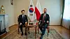 Kang Hoon-sik, left, presidential chief of staff, poses for a photo with Polish Deputy Prime Minister and Defense Minister Władysław Kosiniak-Kamysz, in this photo captured from X on Oct. 21. [YONHAP]
