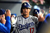 Los Angeles Dodgers designated hitter Shohei Ohtani celebrates with teammates after hitting a home run in the eighth inning against the Los Angeles Angels at Angel Stadium on Aug.11. [REUTERS/YONHAP]