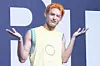 Cortis’s James poses for photos during a showcase for the release of the band’s first EP, ″Color Outside the Lines,″ at the Blue Square in central Seoul on Aug. 18. [DANIELA GONZALEZ PEREZ]