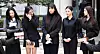 Members of girl group NewJeans answer questions from reporters after attending a court hearing at the Seoul Central District Court in southern Seoul on March 7. [YONHAP]
