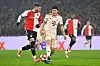 Bayern Munich defender Kim Min-jae, right, vies for the ball during the UEFA Champions League match against Feyenoord at Feyenoord Stadium in Rotterdam, Netherlands on Jan. 22. [AFP/YONHAP]