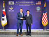 Korean Defense Minister Ahn Gyu-back, right, and U.S. Defense Secretary Pete Hegseth shake hands prior to the 57th Security Consultative Meeting at the Defense Ministry in Seoul on Nov. 4, 2025. [JOINT PRESS CORPS]