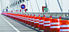 Plastic barrels have been reinstalled along the Incheon Bridge, shown in this image taken Nov. 18. [YONHAP]