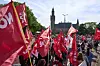 Demonstrators pass the Peace Palace, housing the International Court of Justice, ahead of the NATO summit in The Hague, Netherlands, June 22. [AP/YONHAP]
