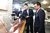 Finance Minister Choi Sang-mok, right, inspects a research site of Rebellions, a chip designer, in Seongnam, Gyeonggi, on Wednesday. [JOINT PRESS CORPS]