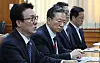 Prime Minister Kim Min-seok, left, speaks during a ministerial meeting on countermeasures against fake news, including the misuse of artificial intelligence, at the Government Complex Seoul in Jongno District, central Seoul, on Feb. 26. [YONHAP]