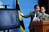 Democratic Party Rep. Han Byung-do points to CCTV footage showing the martial law command cutting off power at the National Assembly in Yeouido, western Seoul, during an emergency press conference at the parliament on Feb. 16.[YONHAP]
