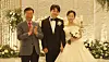 Seongnam mayor Shin Sang-jin, left, poses with a newlywed couple who were matched through the city's mass blind date program, ″Solomon's Choice,″ last year. [SEONGNAM CITY GOVERNMENT]