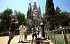 People fill up their bottles from a fountain next to Sagrada Familia Basilica during a heatwave in Barcelona, Spain, on June 30, 2025. [REUTERS/YONHAP]