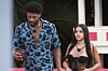 This image released by Peacock shows Chris Seeley, left, and Huda Mustafa from the reality series ″Love Island USA.″ [AP/YONHAP]