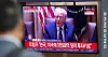 A citizen watches a news broadcast on the Korea-U.S. tariff negotiations at the waiting room of Seoul Station in Yongsan District, central Seoul, on July 31. [YONHAP]