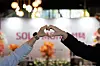 Participants of Seongnam's matchmaking program, ″Solomon's Choice,″ make a heart shape with their hands last November. [SEONGNAM CITY GOVERNMENT]