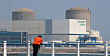 A citizen looks at the Kori-1 nuclear reactor, Korea's first commercial nuclear power plant, in Busan on June 26. [NEWS1]