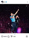 Jin of boy band BTS performs with Coldplay vocalist Chris Martin on April 19 at Coldplay's concert held in Goyang, Gyeonggi. [SCREEN CAPTURE]