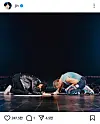 Jin of boy band BTS and Coldplay vocalist Chris Martin bow to each other on April 19 at Coldplay's concert held in Goyang, Gyeonggi. [SCREEN CAPTURE]