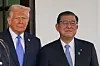U.S. President Donald Trump, left, welcomes Japanese Prime Minister Shigeru Ishiba to the White House in Washington on Feb. 7. [REUTERS/YONHAP]