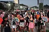 Fans cheer as they wait for the start of Lady Gaga's free concert on Copacabana beach in Rio de Janeiro, May 3. [AP/YONHAP]