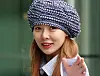 HyunA waves to fans as she heads to the SBS television network in Yangcheon District, western Seoul, on May 7, 2024. [NEWS1]
