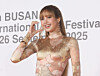Blackpink's Lisa poses for the red carpet at the opening ceremony of the Busan International Film Festival at the Busan Cinema Center in Haeundae District, Busan, on Sept. 17. [YONHAP]