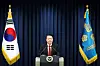 Korean President Yoon Suk Yeol speaks in an unannounced press conference at the Yongsan presidential office in central Seoul Tuesday night. [YONHAP]