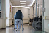 A patient at a hospital in Eunpyeong District, northern Seoul, walks in the hallway on April 4, 2024. [YONHAP]