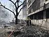 Firefighters work at the site of an airplane that crashed in India's northwestern city of Ahmedabad in Gujarat state on June 12. [AP/YONHAP]
