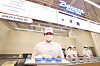 An employee showcases a selection of Benson’s premium ice cream flavors at Benson Creamery Seoul in Gangnam District, southern Seoul, on May 19. [YONHAP]