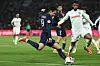 Paris Saint-Germain's Lee Kang-in, left, kicks the ball in front of Le Havre's Loic Nego at Parc des Princes in Paris on Saturday. [AFP/YONHAP]