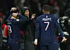 Paris Saint-Germain manager Luis Enrique, center, speaks to Lee Kang-in and Kylian Mbappe before they come on as substitutes at the start of the second half in a match against Le Havre on Saturday at Parc des Princes in Paris. [REUTERS/YONHAP]