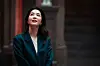 A still from the second season of Netflix's mind-game survival show ″The Devil's Plan: Death Room,″ featuring announcer Kang Ji-yeong [NETFLIX]