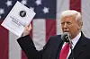 U.S. President Donald Trump holds the 2025 National Trade Estimate Report on Foreign Trade Barriers by the Office of the United States Trade Representative during an event to announce new tariffs at the White House in Washington on April 2. [AP/YONHAP]