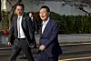 Former President Yoon Suk Yeol walks past supporters as he leaves the presidential residence in Hannam-dong, Yongsan District, central Seoul, on April 11. [JOONGANG ILBO]