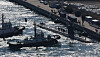 The nuclear-powered USS Alexandria docks at Busan Naval Base on Feb. 10. Making its first visit to South Korea, the submarine measures 110 meters in length and 10 meters in width, carries a crew of about 140, and can travel underwater at speeds exceeding 45 kilometers per hour. [SONG BONG-KEUN]