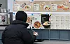 A customer eats alone at a restaurant in Seoul on Jan. 4, 2024. [YONHAP]